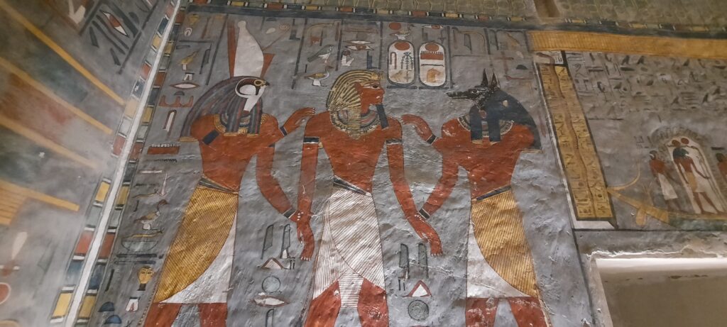 Painted gods on a tomb wall in the Valley of the Kings
