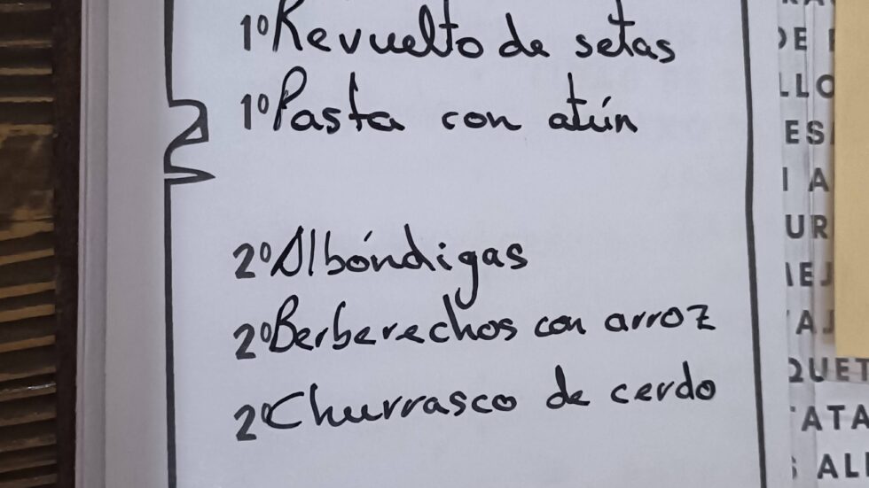 Handwritten menu del día board at a cafe on the Camino