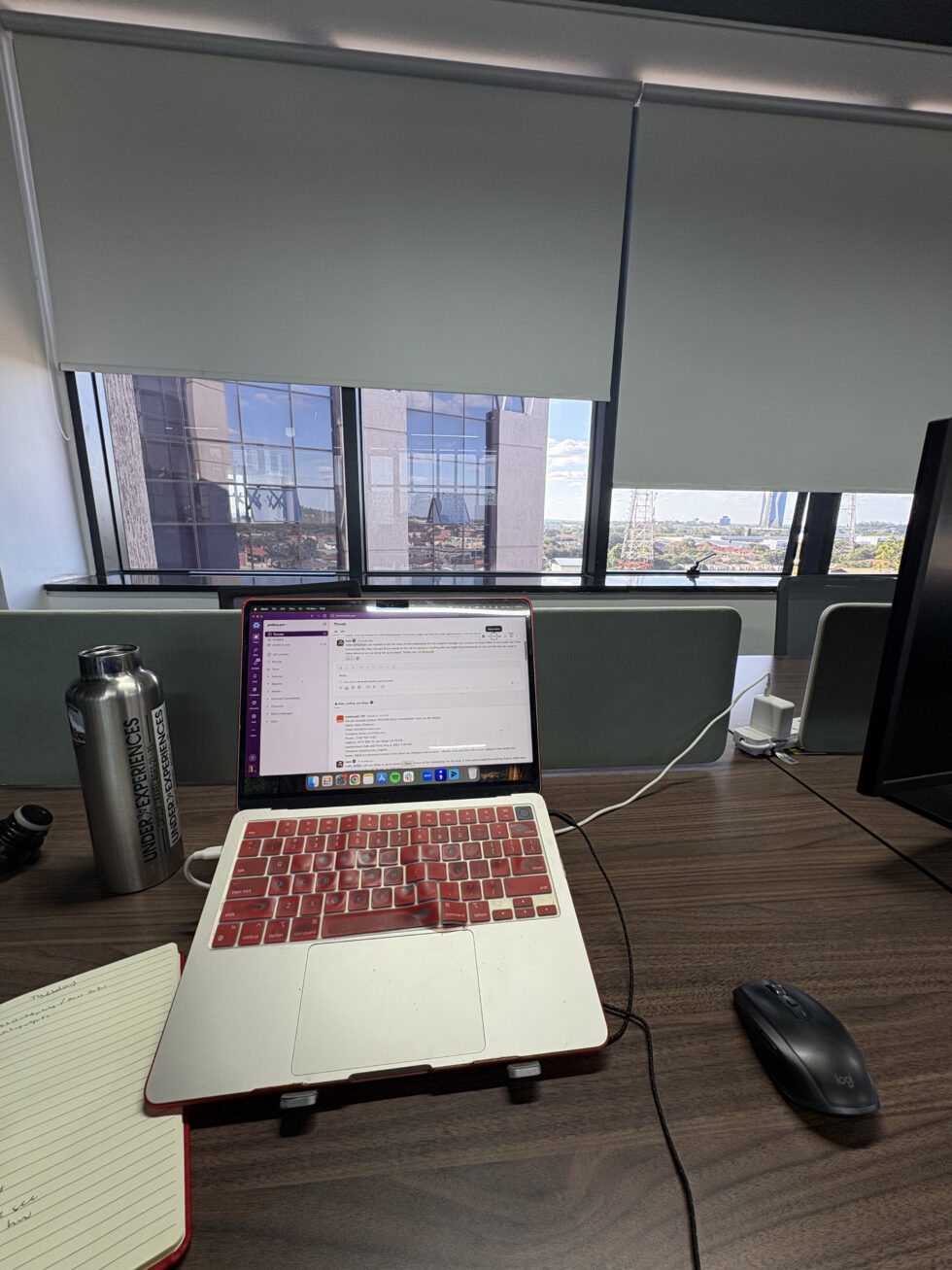 Laptop set up at a desk in a Lusaka office