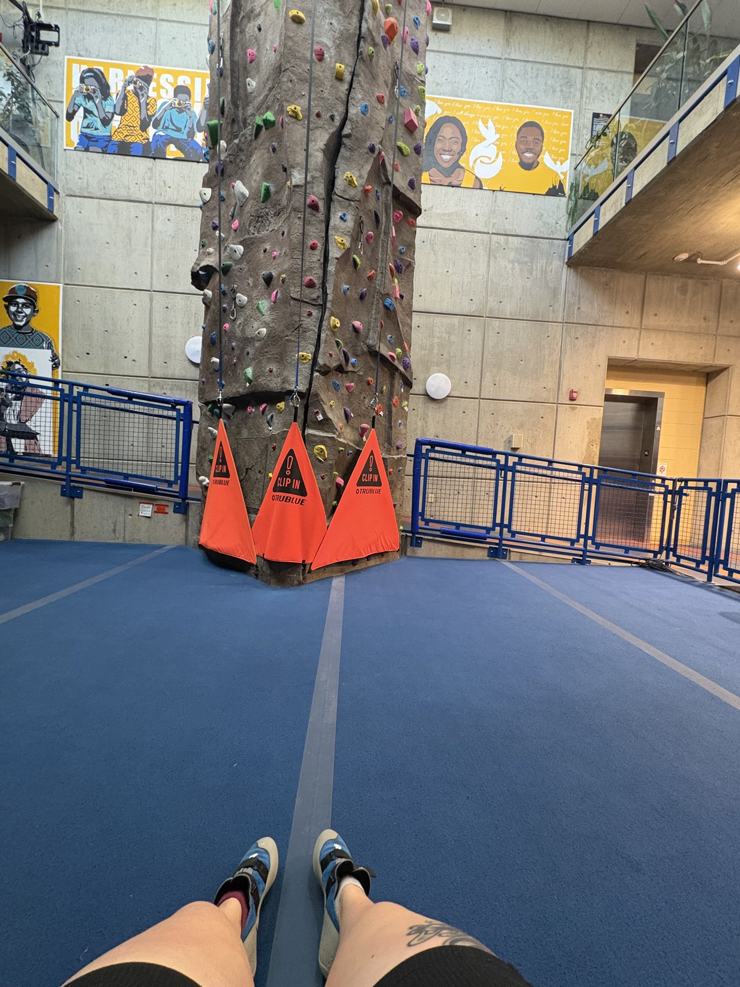 The climbing tower at the Pip Moyer Recreation Center, rising several stories above padded mats.